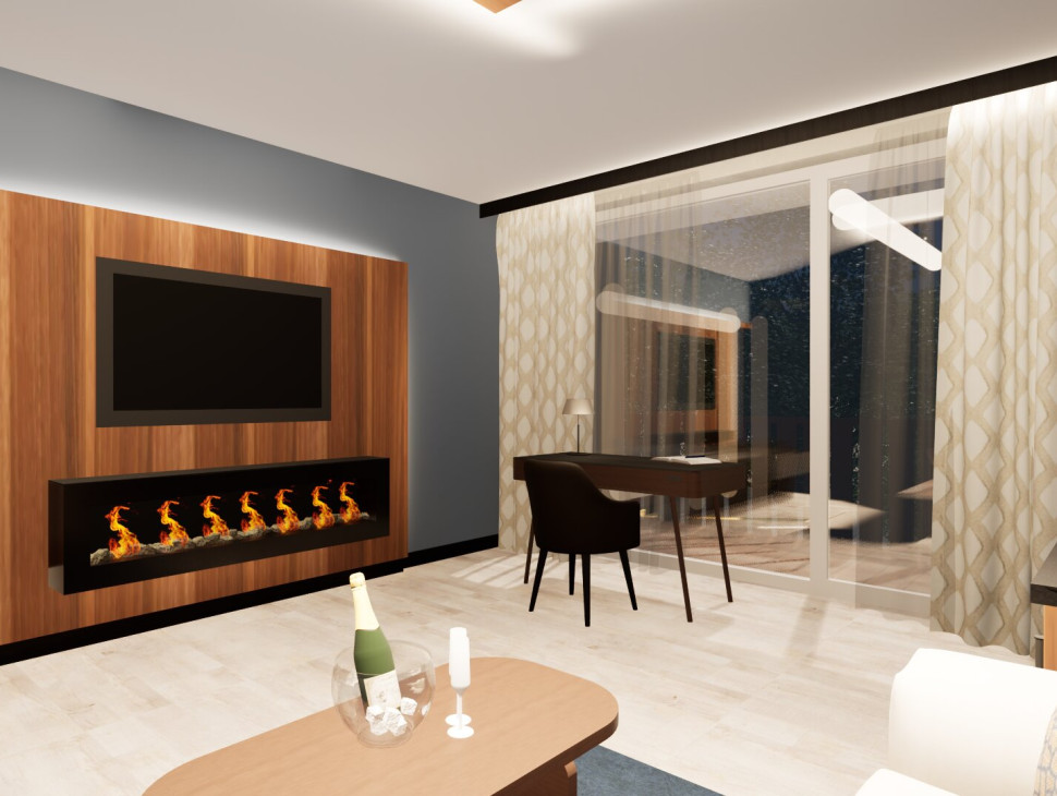 Königshof Premium Suite Wohnzimmer mit Elektrokamin